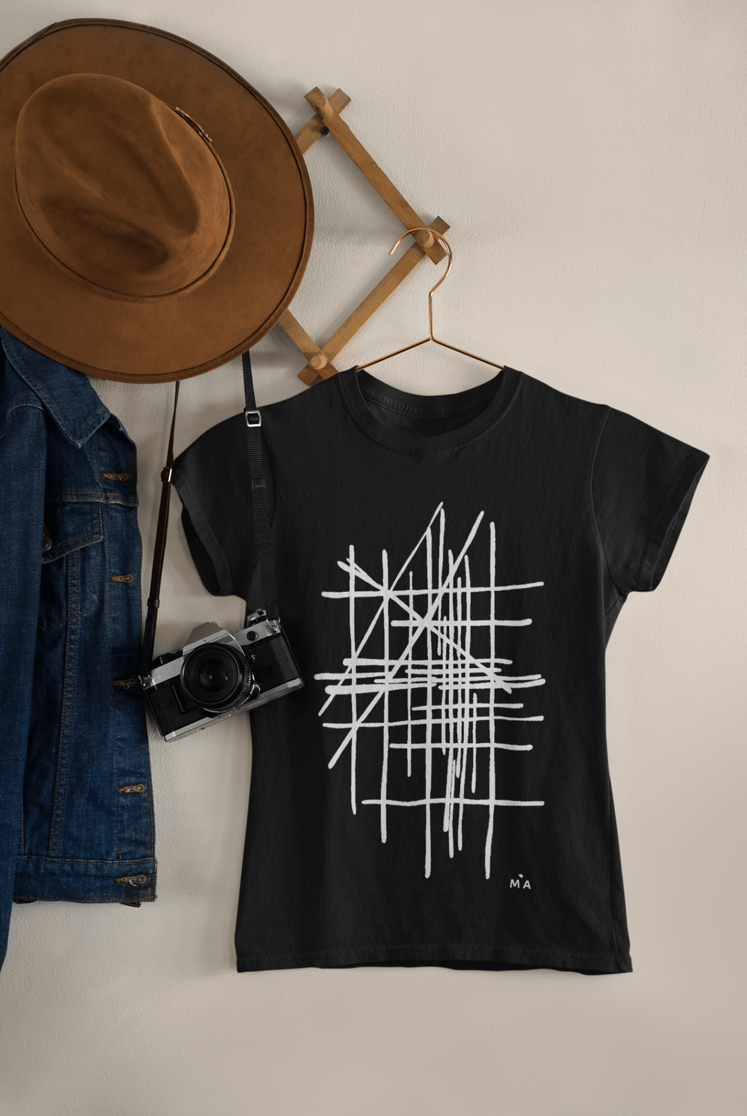 t-shirt-on-a-wall-hanger-with-abstract-design