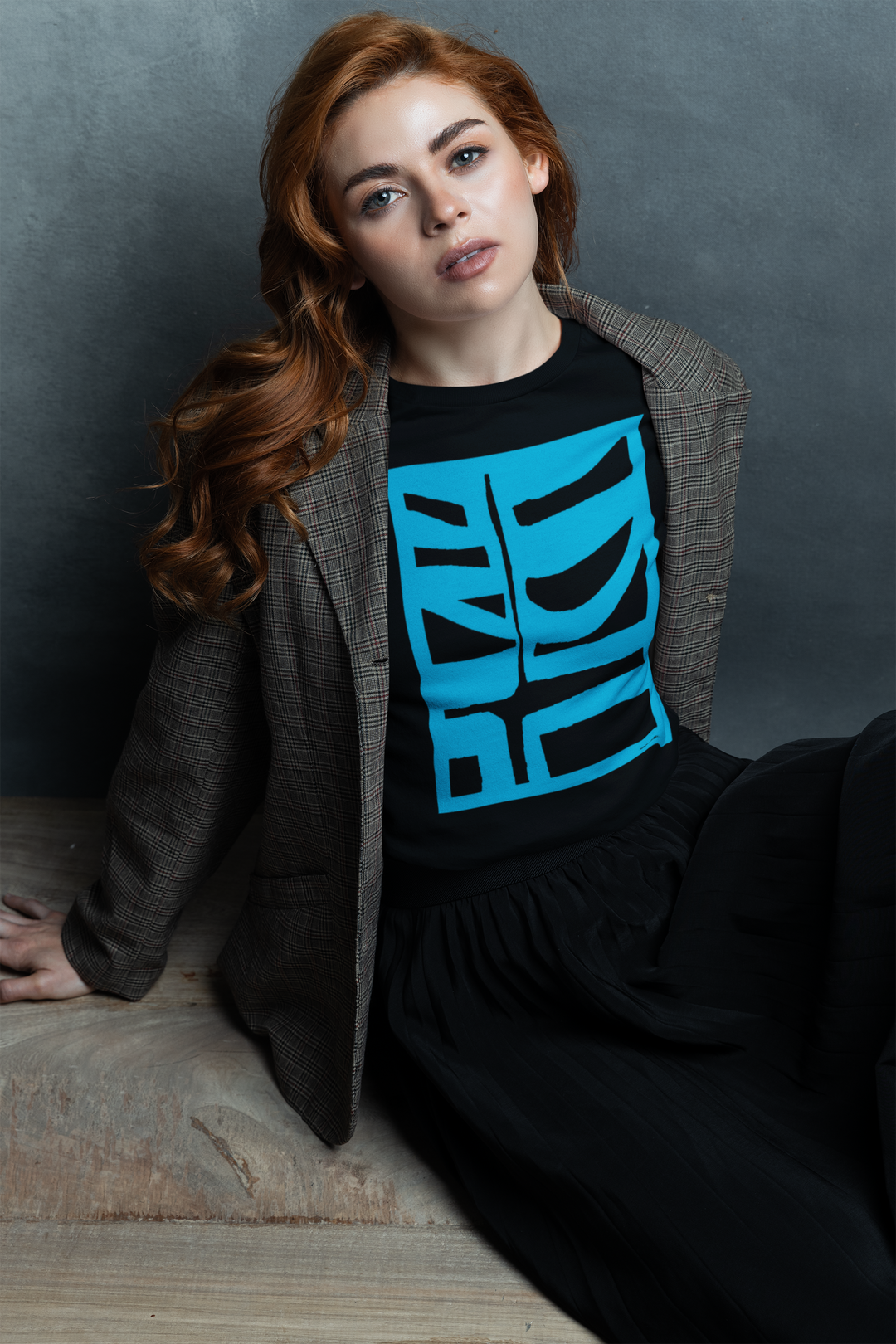 woman posing for an shoot wearing abstract t shirt BI 500 in blue