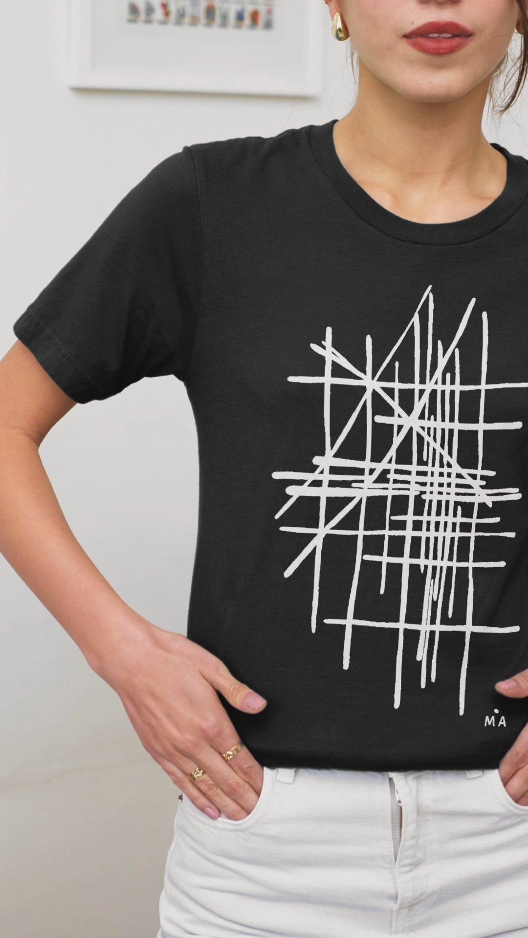 video-featuring-a-smiling-cropped-face-woman-wearing an abstract t-shirt